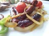 Merguez aux poivrons, oignons et tomates cerises