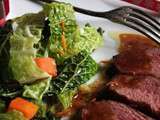 Magret de canard sauce à l’orange et émincé de chou vert