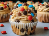 Monster Cookie Dough Cupcakes with Creamy Frosting and Chocolate Chips