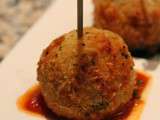 Boulettes de riz fourrées au jambon et à la mozzarella (arrancini)