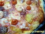 Pizza crevettes/ananas/chorizo/jambon