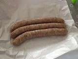 Saucisses de volaille. Persiler