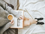 Woman Holding a Cup of Coffee