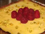 Tarte creme de citron, zestes de citron confits et framboises