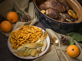 Dinde farcie au foie gras, épices et oranges cuite en terrine à baeckeoffe