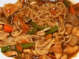 Vegetables and chicken stir fry with rice noodles