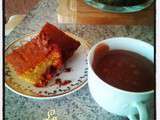 Cake au jus d'orange , cerises séchées et amandes hachées