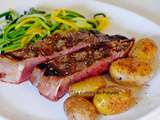 Côte à l'os aux herbes de Provence accompagnée de pommes de terre grenailles et tagliatelles de courgette