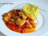 Poulet et poivron rouge accompagnés d'un risotto aux petits légumes