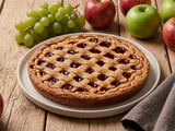 Tarte Linzer : croisillons dorés et cœur framboise