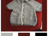 Petit gilet gris pour un bébé