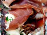 Homards grillés au beurre d'herbes fraîches et prosciutto