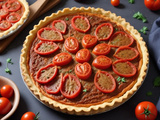 Tarte fine aux tomates cœur de boeuf sur un lit de moutarde