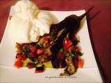 Burrata sur son lit d'aubergine fondante et tomate noire