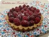 Tartelettes aux framboises sur lit d'amandes