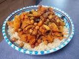 Tajine de courges aux pois chiches, amandes et raisins secs