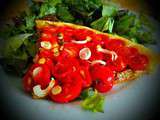 Tarte fine aux tomates cerises sur lit de moutarde ancienne et ail des ours