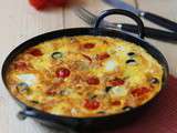 Tortilla aux tomates cerise ,olives noires et feta