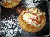 Tartelettes garnies de crème d'amande-coco-noisette et de confiture de clémentines