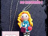 Pendentif poupée   Alice in wonder school  à gagner