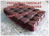 Fondant au chocolat sur lit de framboises