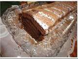 Biscuit roule chocolate fourre a la confiture de fraise