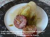 Gratin d'endives nappées de cancoillotte et garnies d'une saucisse de Morteau